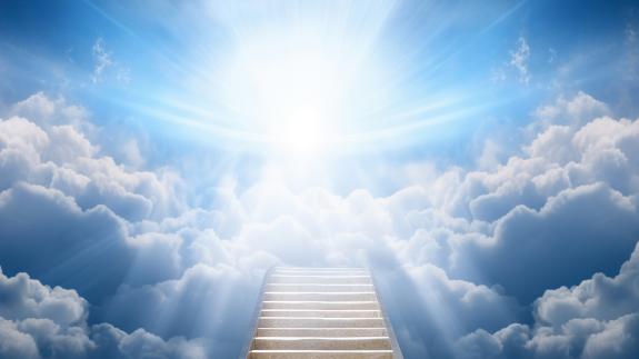 A bright white light and a staircase in the sky