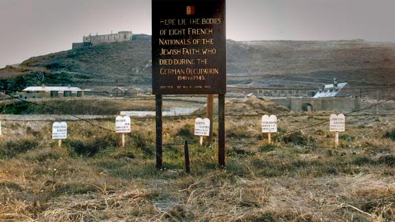 A sign commemortating eight French people of the Jewish faith who were killed on Alderney during the war