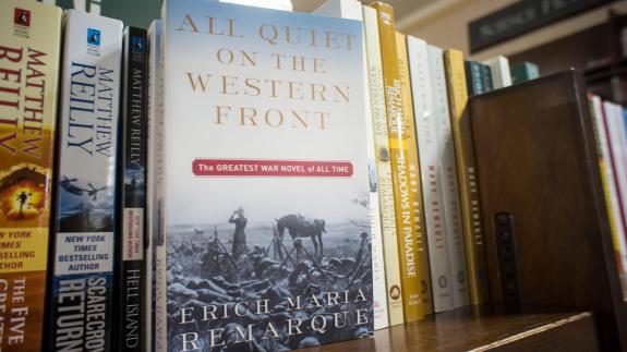 A copy of 'All Quiet on the Western Front' on a bookshelf