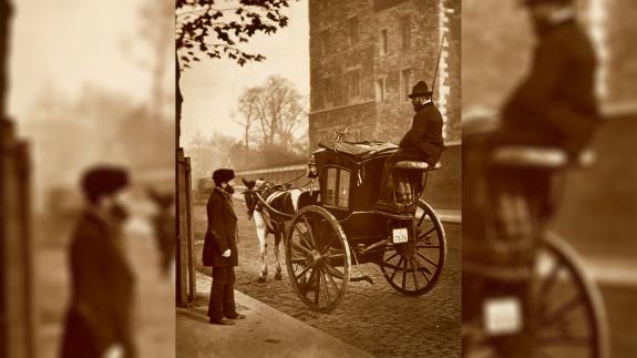 A hansom cab on a London street in 1877