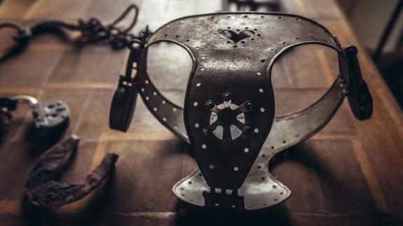 An old iron chastity belt on display