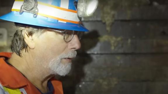 Rick Lagina wearing a hard hat with a head torch