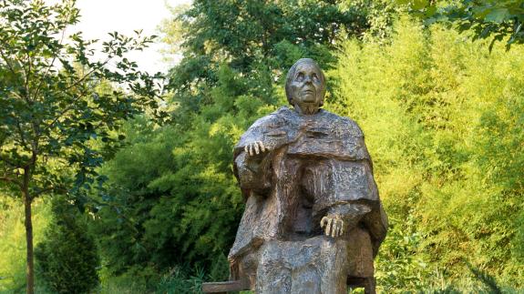 A sculpture of Baba Vanga in a park