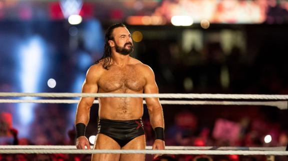 Drew McIntyre standing in the middle of wrestling ring
