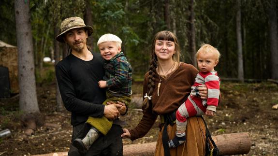 Chance and Soraya Painter holding two of their children