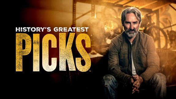 Mike Wolfe sitting next to the show title