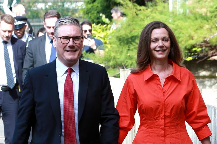 Keir Starmer and his wife Victoria walk hand-in-hand