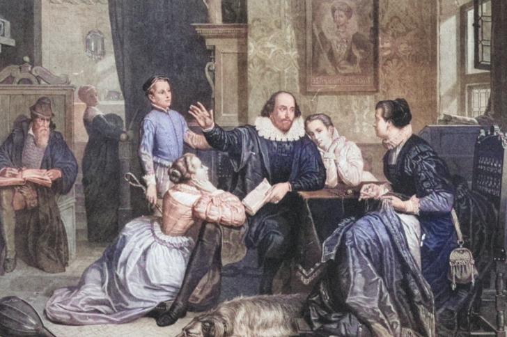 Colourised image of William Shakespeare talking to his family. His wife and daughters sit listening to him while his son, Hamnet, stands over his shoulder