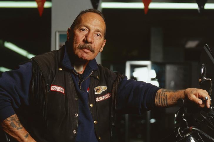 Sonny Barger sitting on a motorcycle
