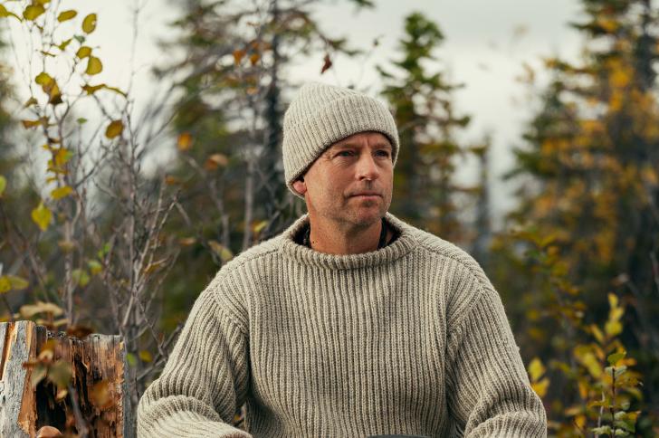 Andrew Price sitting in the forest