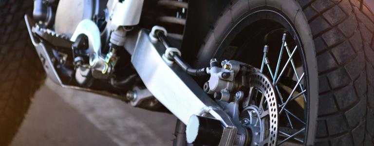 A close-up photograph of a motorcycle