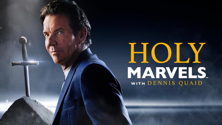 'HOLY MARVELS' - Dennis Quaid standing in front of the sword in the stone