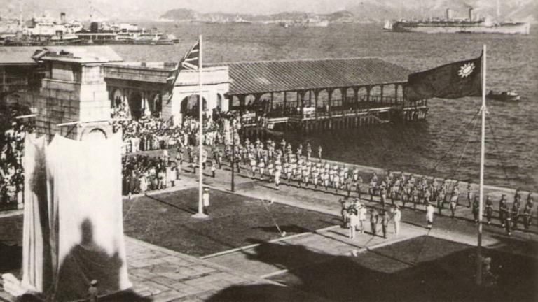 A ceremony to celebrate the liberation of Hong Kong at the Hong Kong Cenotaph in 1945