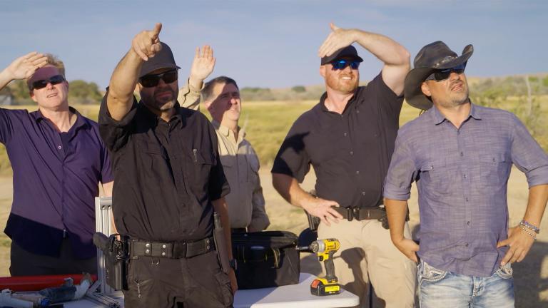 (L - R) Travis Taylor, Bryant ‘Dragon’ Arnold, Erik Bard, Kaleb Bench and Thomas Winterton look to the sky. Bryant is pointing at something in the sky while Brandon, Erik and Kaleb shield their eyes from the sun