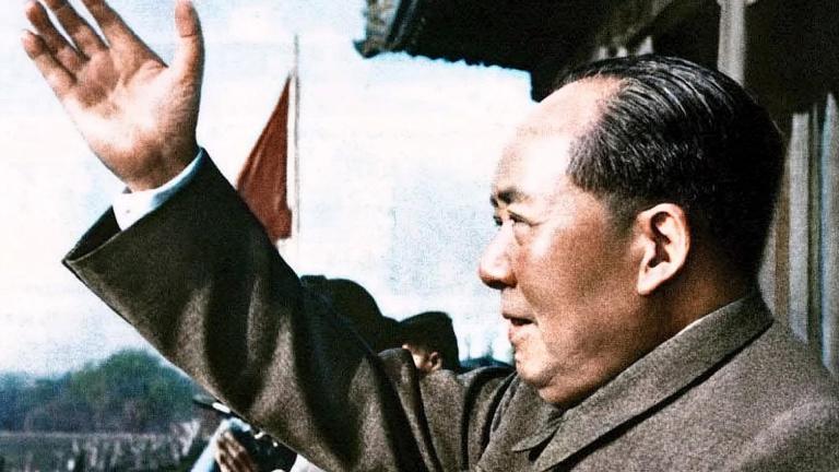 Mao Zedong salutes a crowd